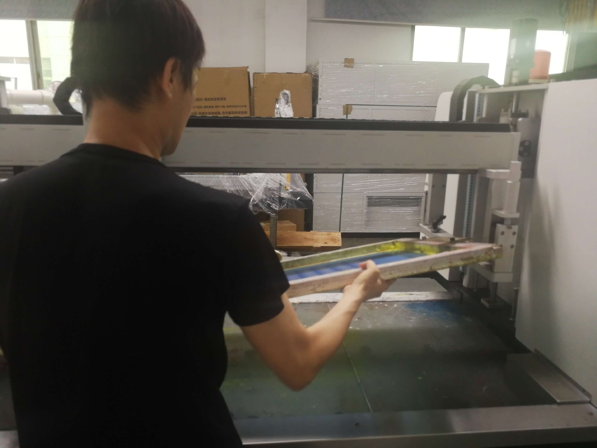 Attach the screen printing plate to the K3 tabletop printing machine